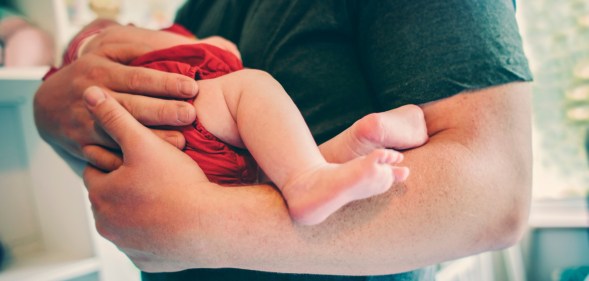 Stock image of a man and baby