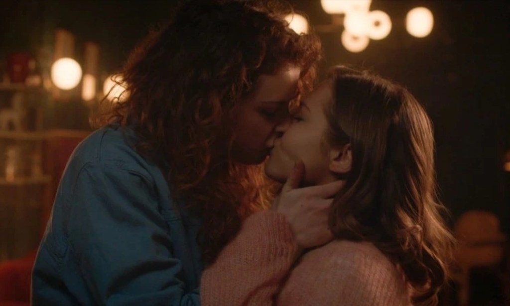 Meredith and Mia share a kiss in the newly cancelled series, Vampire Academy. (Peacock)