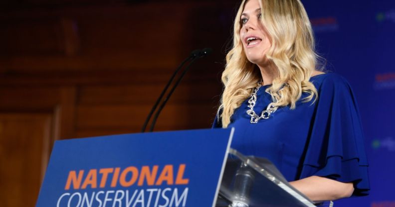 Miriam Cates, in a blue dress, speaking at the National Conservatism conference.