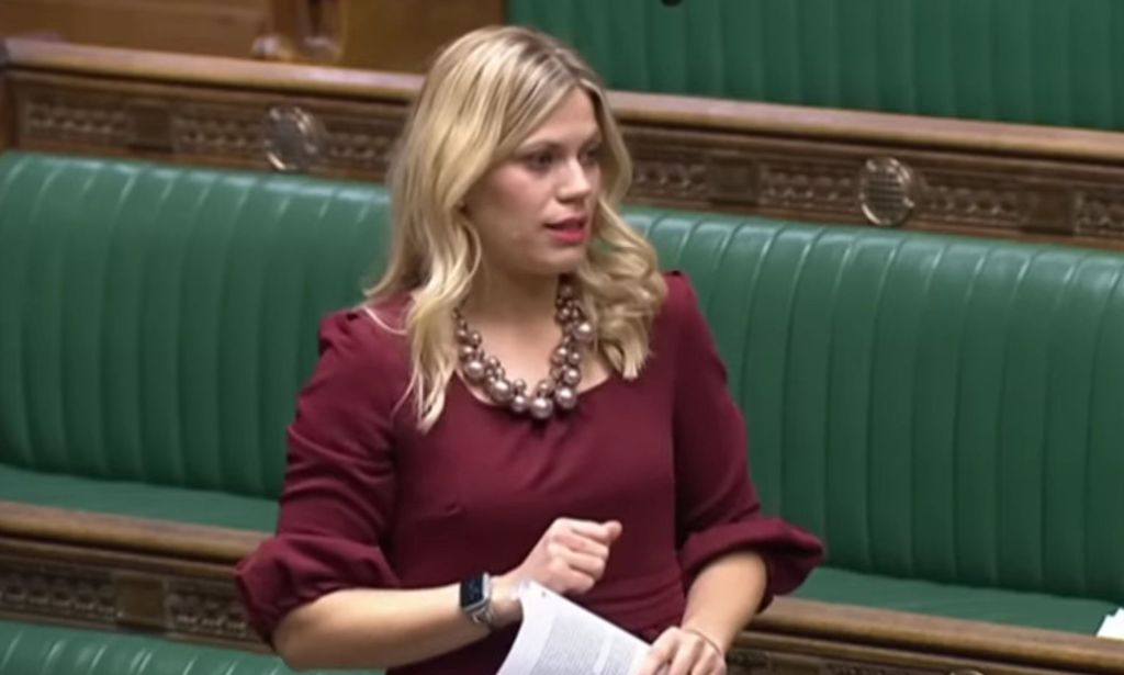 Miriam Cates, wearing a burgundy dress, speaks at the House of Commons.