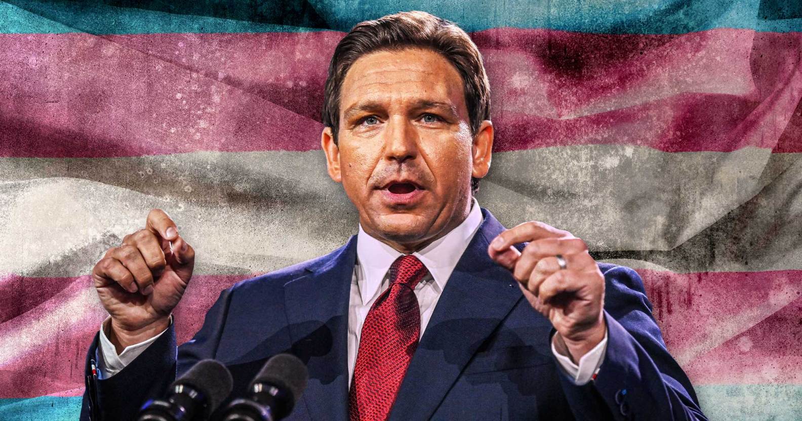 Ron DeSantis in front of a tranas flag