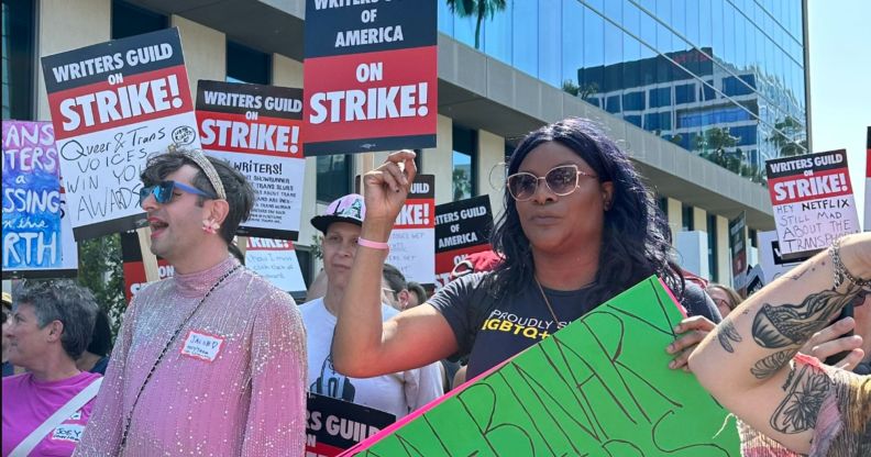 Trans and non-binary TV and film writers on the picket line outside Netflix in LA, as part of the ongoing writers' strike.