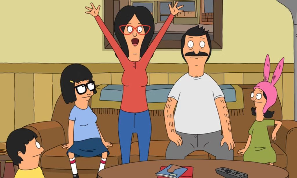 A still from the animated TV show Bob's Burgers showing Linda Belcher standing up with her arms waving in the air while her family members (including husband Bob, daughters Louise and Tina and son Gene) sit around her