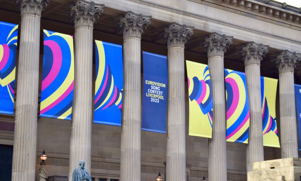 Liverpool is staging the Eurovision Song Contest on behalf of Ukraine. Here a picture shows Liverpool's City Hall with a Eurovision poster on it.