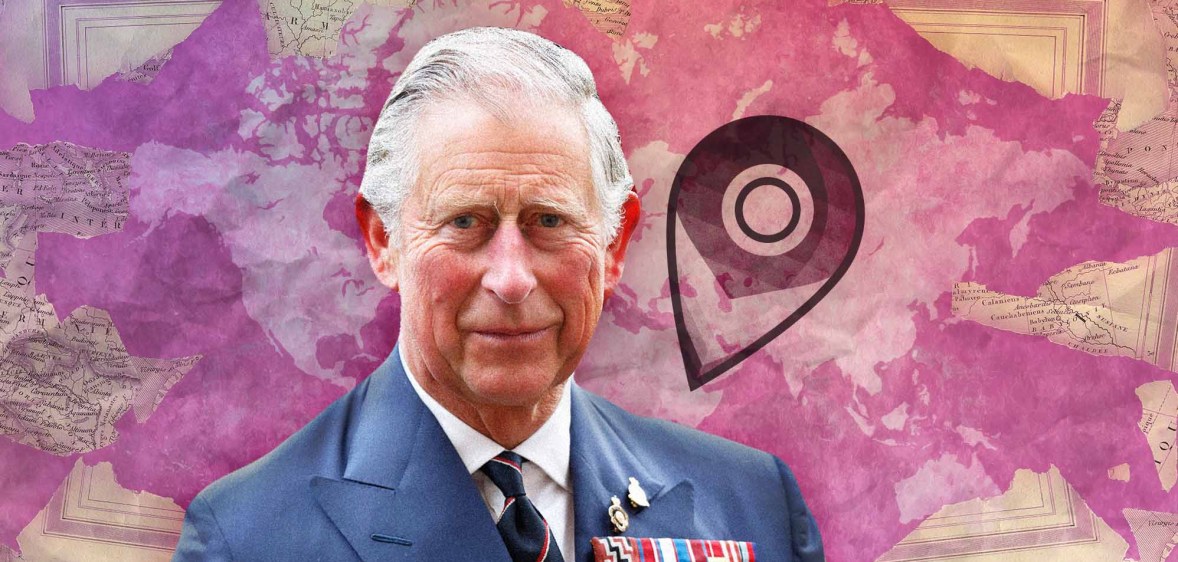 King Charles in front of a world map