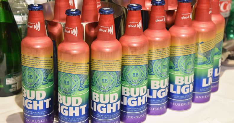A colection of Pride-themed Bud Light bottles.