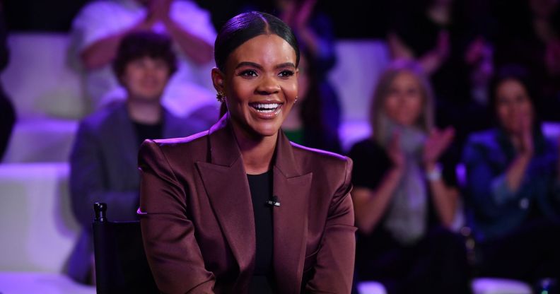 Talk-show host Candace Owens sits on a chair smiling