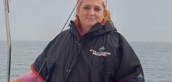 Trans woman Charlotte Hale on a boat