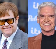 On the left, Elton John in black and yellow glasses, a grey suit, white shirt and blue and purple tie. On the right, Phillip Schofield in a black t-shirt and brown jacket. Both are smiling at the camera.