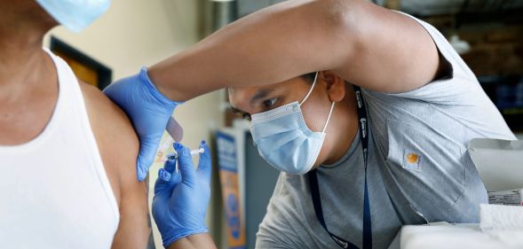 A person receives a vaccine.