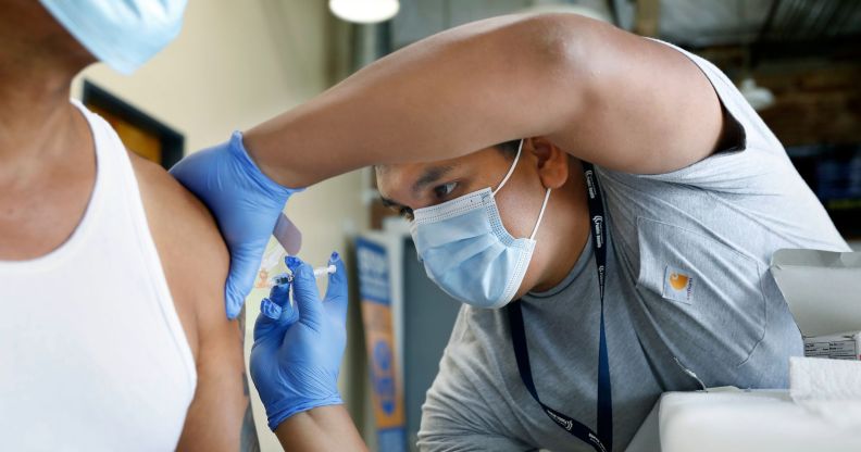 A person receives a vaccine.