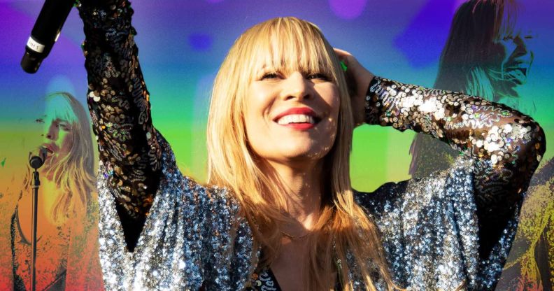 Natasha Bedingfield performing at Mighty Hoopla against a rainbow pride background.