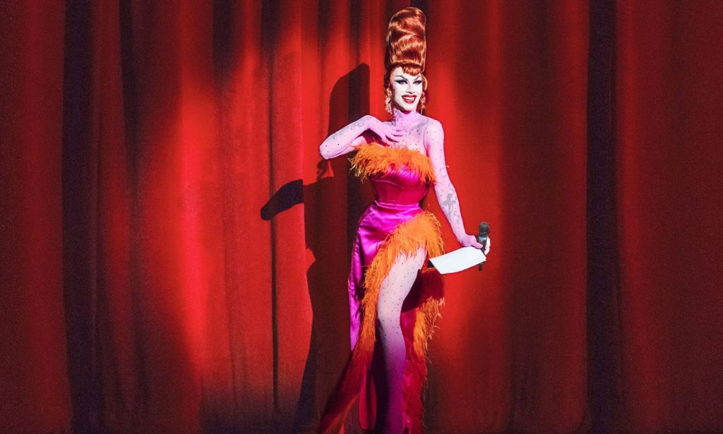 Drag queen Sasha Velour performs in a pink and orange gown as part of her show NightGowns.
