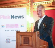 Equalities minister Stuart Andrew speaking at the PinkNews Westminster Pride Reception