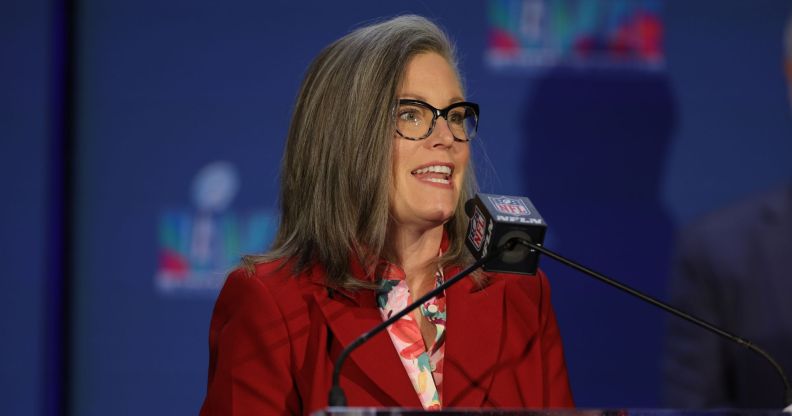 Arizona governor Katie Hobbs speaking into a microphone