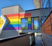 NHS hospital adorned with Progress Pride flag mural