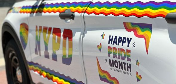 A picture of a NYPD police car decorated in rainbows and colourful designs to celebrate LGBTQ+ Pride Month