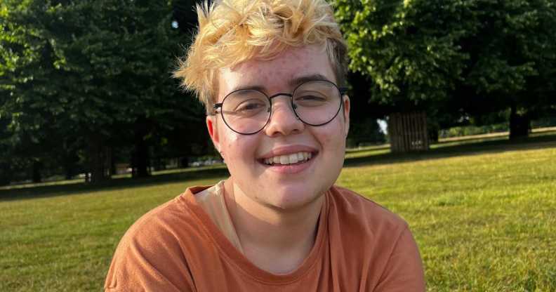 Ben, a young white transmasc person with bleach blonde hair