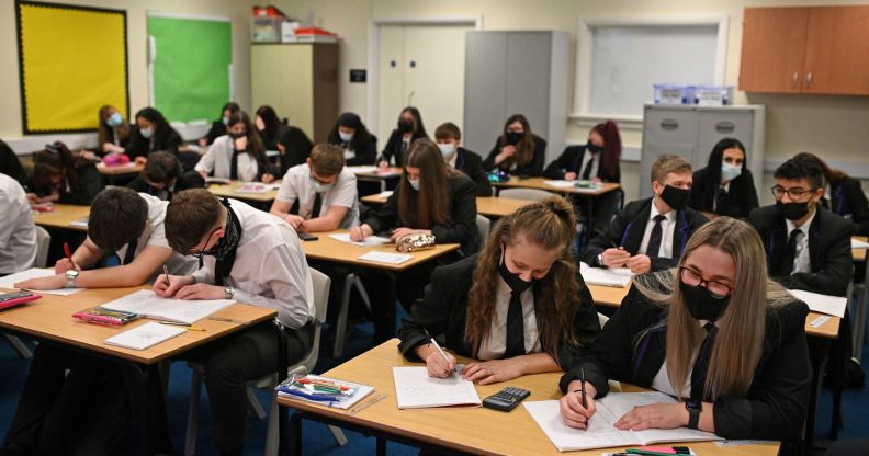 A group of students in a UK school gather together to take their GCSEs