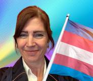 Aby Hawker, CEO and founder of TransMission PR, a communications consultancy which specialises in trans and non-binary inclusion and awareness, next to a trans Pride flag
