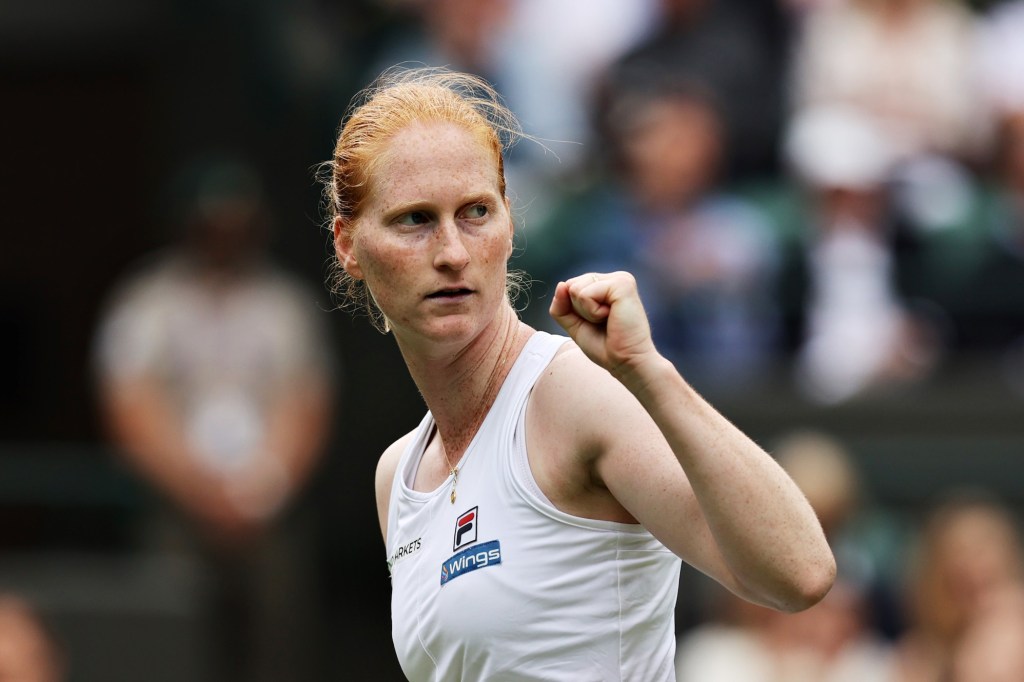 LONDON, ENGLAND - JUNE 30: Alison Van Uytvanck of Belgium celebrates a point in her Ladies' Singles First Round match against Elina Svitolina of Ukraine during Day Three of The Championships - Wimbledon 2021 at All England Lawn Tennis and Croquet Club on June 30, 2021 in London, England. (Photo by Clive Brunskill/Getty Images)