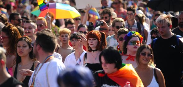 Crowds of LGBTQ+ activists march across Budapest.