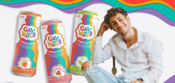This is a composite image of Spencer Hoddeson, CEO of Gay Water. He is sitting on a chair with his legs cross. Behind him are cans of Gay Water.