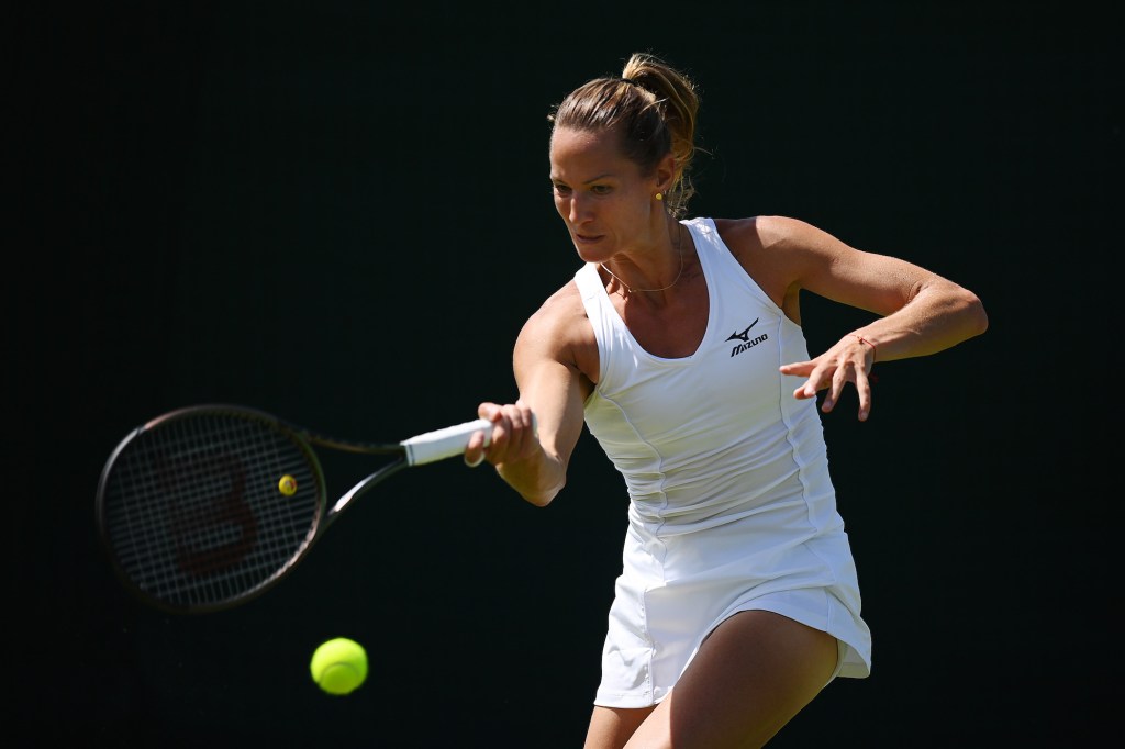 LONDON, ENGLAND - JUNE 21: Conny Perrin of Switzerland plays a forehand against opponent Kaylah McPhee of Australia in their Ladies' Qualifying Singles First Round match during Day 2 of Wimbledon Championships Qualifying at Wimbledon Qualifying & Community Sports Centre on June 21, 2022 in London, England. (Photo by Justin Setterfield/Getty Images)