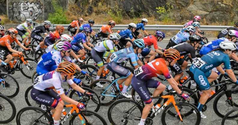 The peloton rides along Gorge Road during stage three of the Women's Tour Down Under UCI cycling event in Adelaide on January 17, 2023.