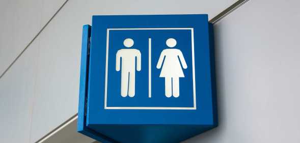 Male and female toilets sign