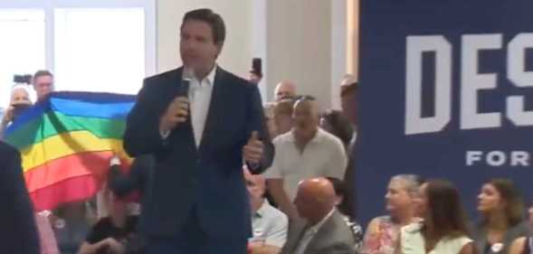 DeSantis' presidential campaign was interrupted by a protestor who waved a Pride flag