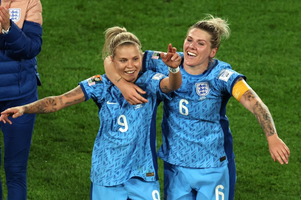 England football players Rachel Daly and Millie Bright celebrate making the 2023 FIFA Women's World Cup final with victory over Australia in the semi-final at Stadium Australia on August 16, 2023 in Sydney, Australia. (Photo by Maryam Majd/Getty Images)