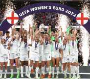 LONDON, ENGLAND - JULY 31: Leah Williamson and Millie Bright of England lift the UEFA Women's EURO 2022 Trophy after their sides victory during the UEFA Women's Euro 2022 final match between England and Germany at Wembley Stadium on July 31, 2022 in London, England. (Photo by Sarah Stier - UEFA/UEFA via Getty Images)