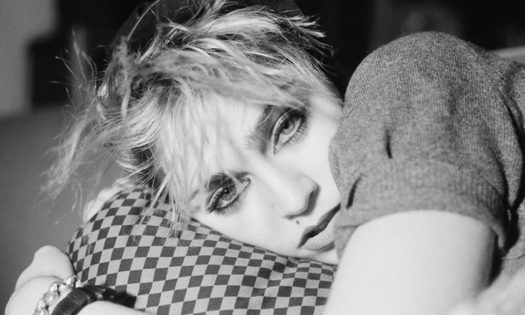 A black and white photo of Madonna taken in 1982.