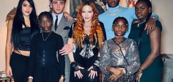 Madonna with her children.