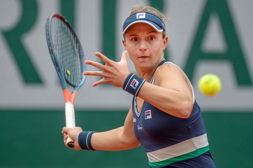 PARIS, FRANCE October 06. Nadia Podoroska of Argentina in action against Elina Svitolina of the Ukraine in the Quarter Finals of the singles competition on Court Philippe-Chatrier during the French Open Tennis Tournament at Roland Garros on October 6th 2020 in Paris, France. (Photo by Tim Clayton/Corbis via Getty Images)