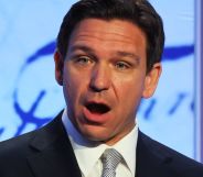 Ron DeSantis, mouth open, speaks during an event.