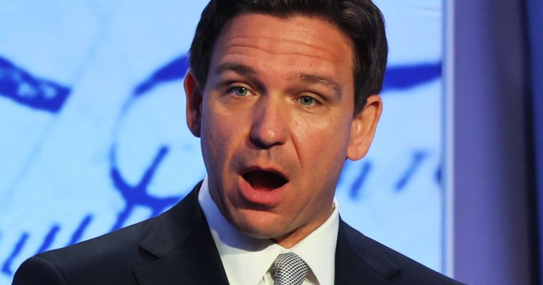 Ron DeSantis, mouth open, speaks during an event.