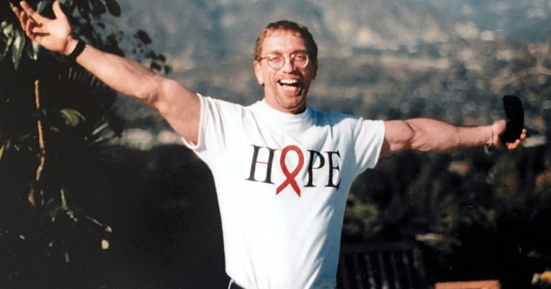 A picture of Steven Pieters, arms outstretched, wearing a Hope t-shirt.