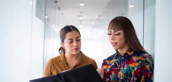 Two people in a workplace