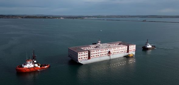 The Bibby Stockholm migrant barge, which will serve as living quarters for up to 500 asylum seekers, arrives at Portland Harbour on July 18, 2023