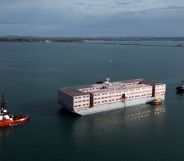 The Bibby Stockholm migrant barge, which will serve as living quarters for up to 500 asylum seekers, arrives at Portland Harbour on July 18, 2023