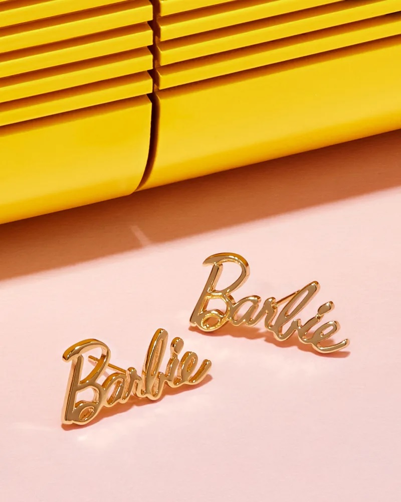 Barbie logo earrings from the Kendra Scott capsule collection.