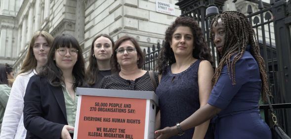 Leila Zadeh, second from the right, pictured with other activists delivering their petition on the Illegal Migration Bill to Downing Street.