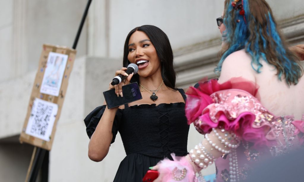 Trans activist, model and writer Munroe Bergdorf wears a black dress as she speaks to a crowd gathered for London Trans+ Pride