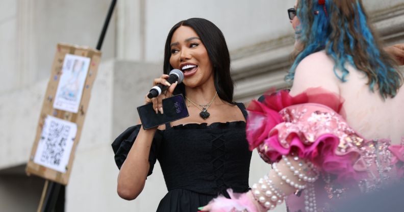 Trans activist, model and writer Munroe Bergdorf wears a black dress as she speaks to a crowd gathered for London Trans+ Pride