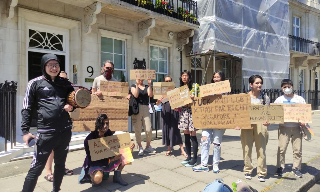 A group of people gather outside the Singapore High Commission in London, UK to protest attacks against the queer and trans people as well as the LGBTQ+ community in Singapore