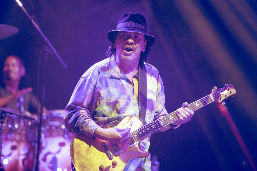 Carlos Santana performing. 