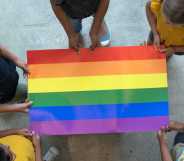 School-age children with Pride flag