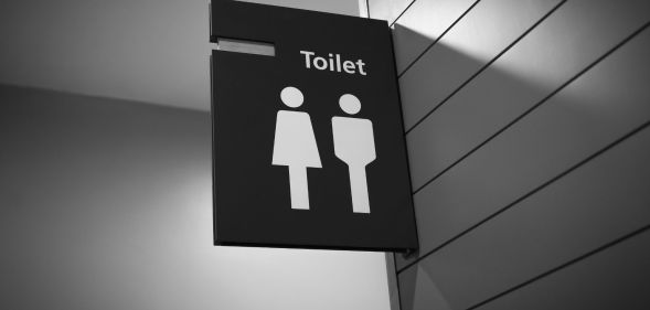 A gender neutral toilet sign.